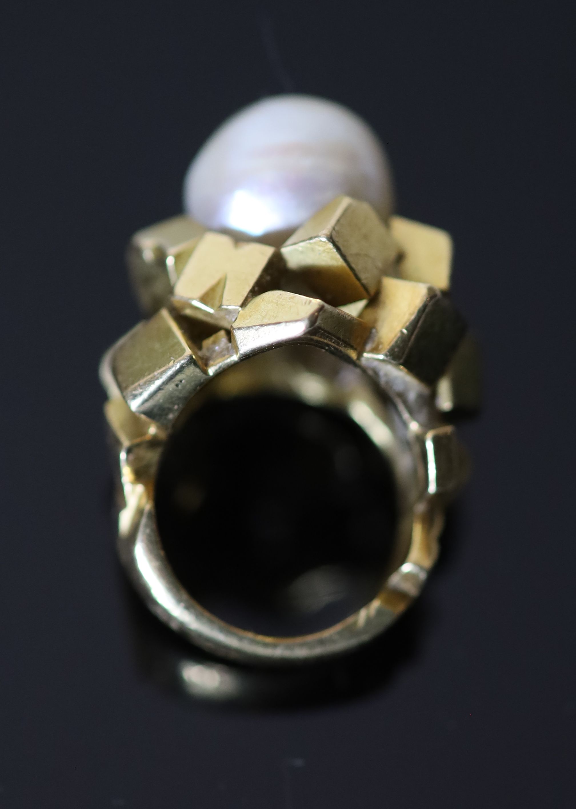 A modern continental 18ct gold (stamped 750) and baroque cultured pearl set modernist dress ring,